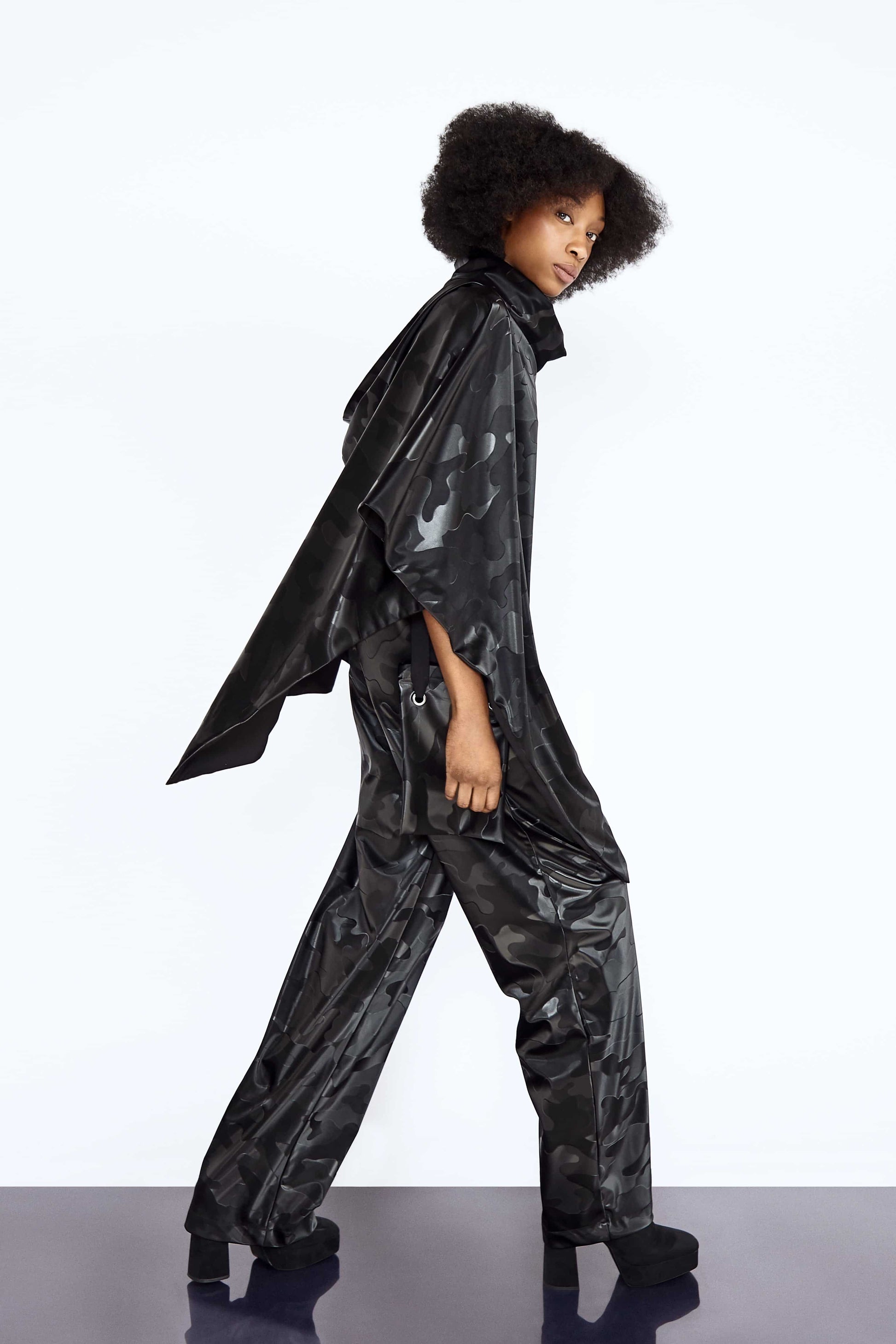 Black Camo Vegan Leather Poncho and Trousers Set blackcamo, boldstyle, hers, pineappleleather, poncho, ponchoset, sustainablefashion, trousersset, two pice set, veganleather, waterproof, womansweare Vidi Blak 