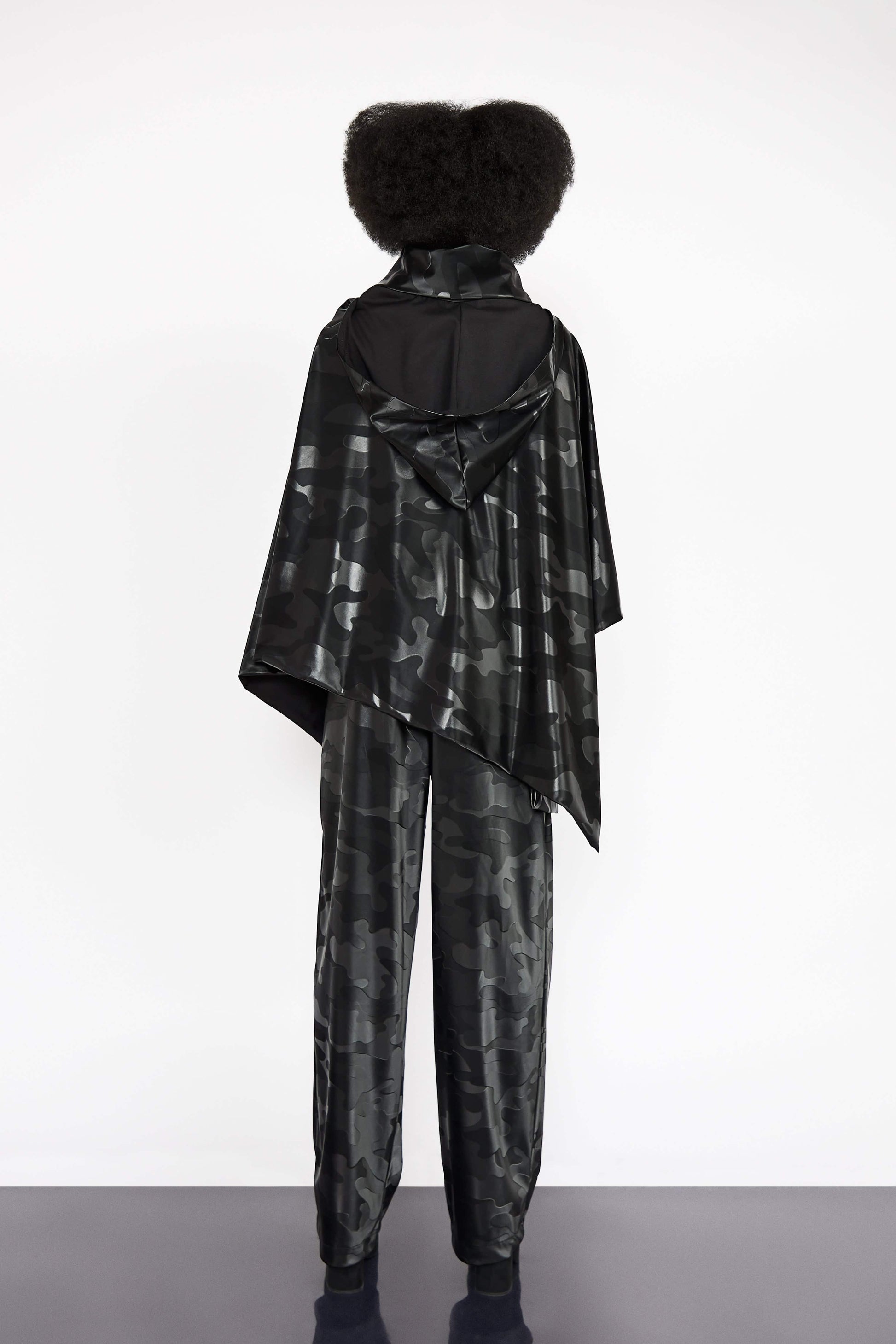 Black Camo Vegan Leather Poncho and Trousers Set blackcamo, boldstyle, hers, pineappleleather, poncho, ponchoset, sustainablefashion, trousersset, two pice set, veganleather, waterproof, womansweare Vidi Blak 